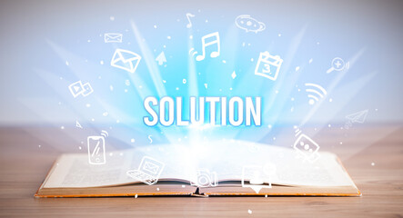 Opeen book with SOLUTION inscription, business concept