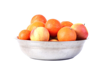 Metal plate with ripe fruits. Isolated object on white background