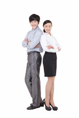 Portrait of businessman and businesswoman standing back to back