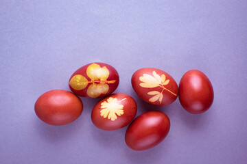 Bright colored eggs on a gray background. Easter theme, holiday. Happy easter card with copy space for text in minimalist easter style. Color of the year. Grey.Happy Easter