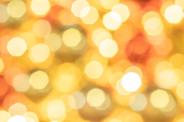 White gold abstract lights. Festive glitter blur Bokeh background. Defocused winter backdrop.