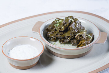 Macro Photo of Traditional Turkish Dolma, Sarma or Dolmades on White Plate.
