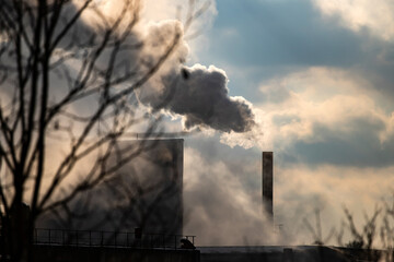 Factory pipe polluting air, environmental problems, smoke from chimneys