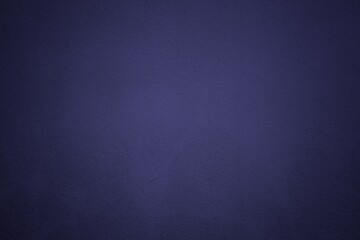Blue Grunge Concrete Wall Texture Background with Spotlight at the Center.