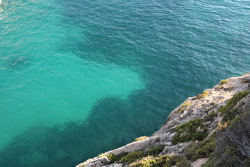 Clear water at Xlendi bay on Gozo at the Mediterranean Sea , Malta