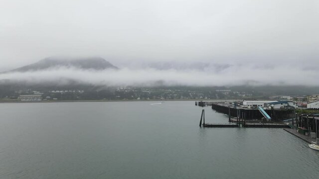 Juneau Alaska with harbor and city in frame aerial