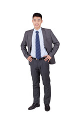 A Successful business man with arms akimbo