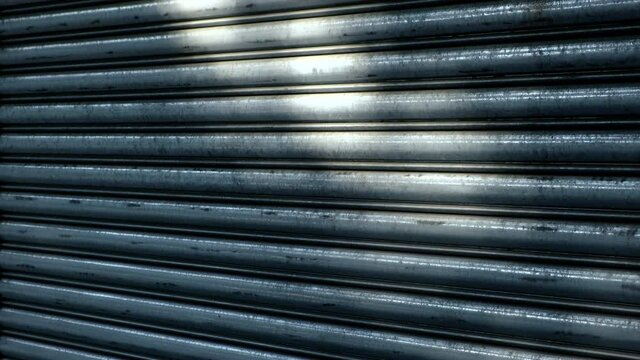 Metal shutter of the closed shop with sunlight