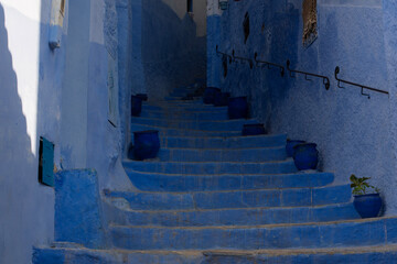 narrow street in the blue city Chefchaouen, Morocco