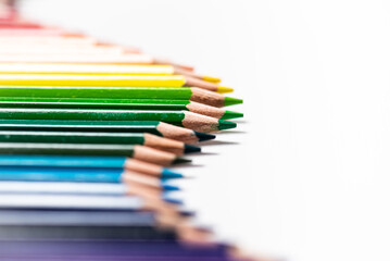 Color pencils on white background. Red, blue, green, yellow wooden pencil for school education. drawing collection for artwork. Realistic set pencils