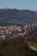 View of Bilbao from a hill in a sunny winter day