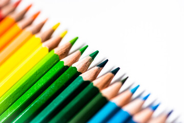 Color pencils on white background. Red, blue, green, yellow wooden pencil for school education. drawing collection for artwork. Realistic set pencils