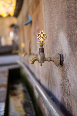 ottoman fountain fountain. old turkish fountain in the courtyard of the mosque