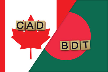 Canada and Bangladesh currencies codes on national flags background