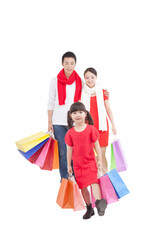 Portrait of daughter holding shopping bags parents holding shopping 