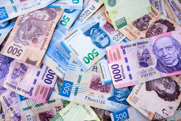 Fototapeta na wymiar Mexico, Mexico City »; December 29 2020, Mexican banknotes placed on each other.