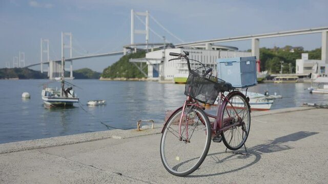 Rental Bike and Nishiseto Expressway in Background on Shimanami Kaido, Japan