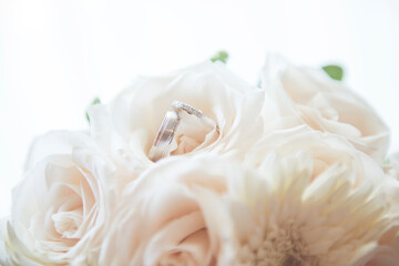 rings on a wedding bouquet