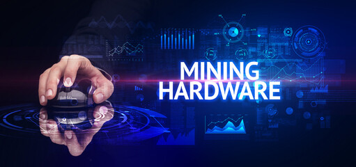 hand holding wireless peripheral with MINING HARDWARE inscription, modern technology concept
