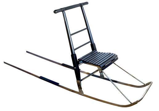 traditional scandinavian sleigh isolated on white background. Kicksled or spark is a slide consisting of a chair mounted on a pair of flexible metal runners. The sled is propelled by kicking ground by