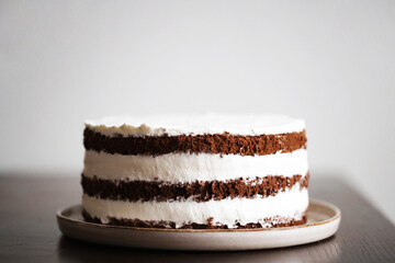 Three layers chocolate cake with a whipped cream filling.