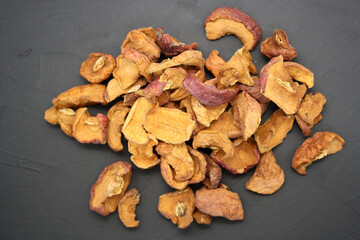 Apples dried on the stove. White background.