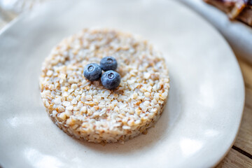 Buckwheat serving with blueberry on a plate