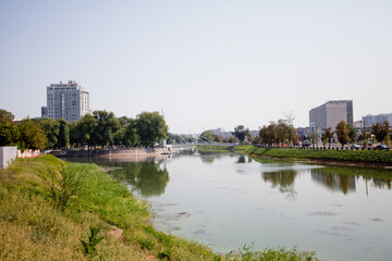 Fototapeta na wymiar River in the city on a summer day