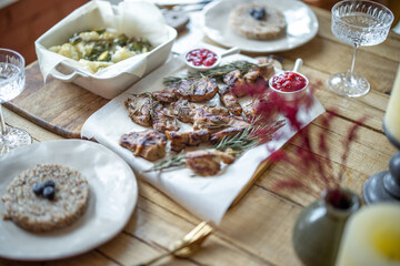 Cooked meat with rosemary and raspberry sauce