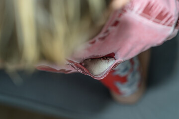 baby playing with hamster