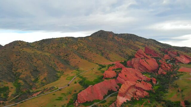 Aerial shot rising up above Red Rocks Park and Amphitheatre