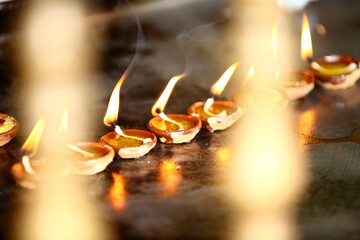 Coconut oil lamps in temple, chennai ,India.