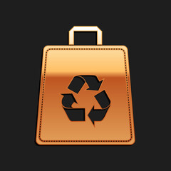 Gold Paper shopping bag with recycle icon isolated on black background. Bag with recycling symbol. Long shadow style. Vector.