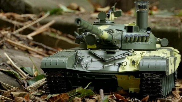 tank in spotted camouflage front view zoon in