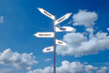 signpost with 6 arrow-shaped signs showing the words WHERE, WHEN, WHAT, HOW MUCH, HOW and WHY in...
