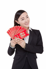 A young Business womman holding red envelope