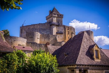 Fototapeta na wymiar Historic castle and roof tops of Castlenaud, France