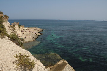 Fototapeta na wymiar Saint Thomas Bay in Marsaskala in summer, Malta