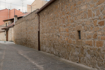 Fototapeta na wymiar street in the old town, stone walls
