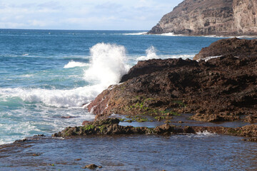 waves crashing on rocks