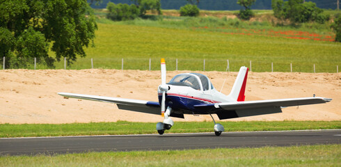Fototapeta na wymiar Image of sports plane at the sport airport, transport vehicles