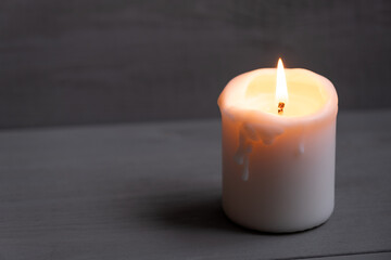 Candles. Home interior decoration. Romantic candles. White and black wax. In glass jars. Romantic atmosphere at home.