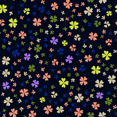 Fototapeta na wymiar Childrens pattern flowers. Seamless floral pattern on a blue background. Multicolored clover leaves on a dark background.
