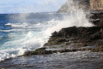 waves crashing on rocks