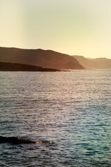 Vertical shot of a calm sea on the coast of Menorca, Islas Baleares in Spain