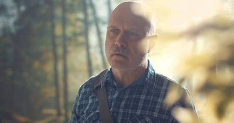 Tourist using binoculars and observing wildlife