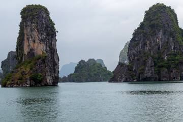 Fototapeta premium Ha Long Bay foggy day landscape, Vietnam