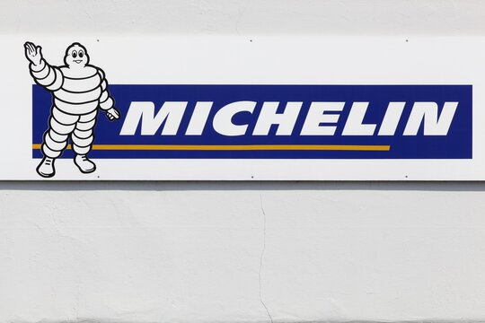 Munster, Germany - July 22, 2018: Michelin logo on a wall. Michelin is a tire manufacturer based in Clermont-Ferrand in France and it's one of the three largest tire manufacturers in the world