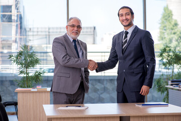 Two businessmen discussing business project