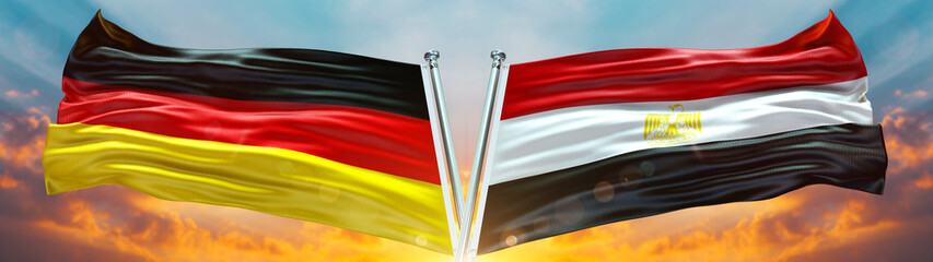 Double Flag Egypt مصر and Germany flag waving flag with texture sky Cloud and sunset